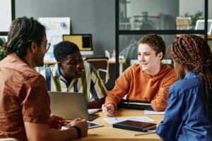 People from different organizations working to identify and mitigate risk to better support youth homelessness through data sharing.